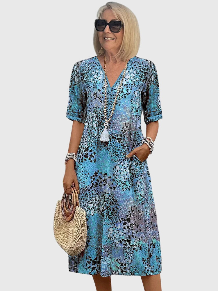 Rikkie | Elegant Floral Midi Dress